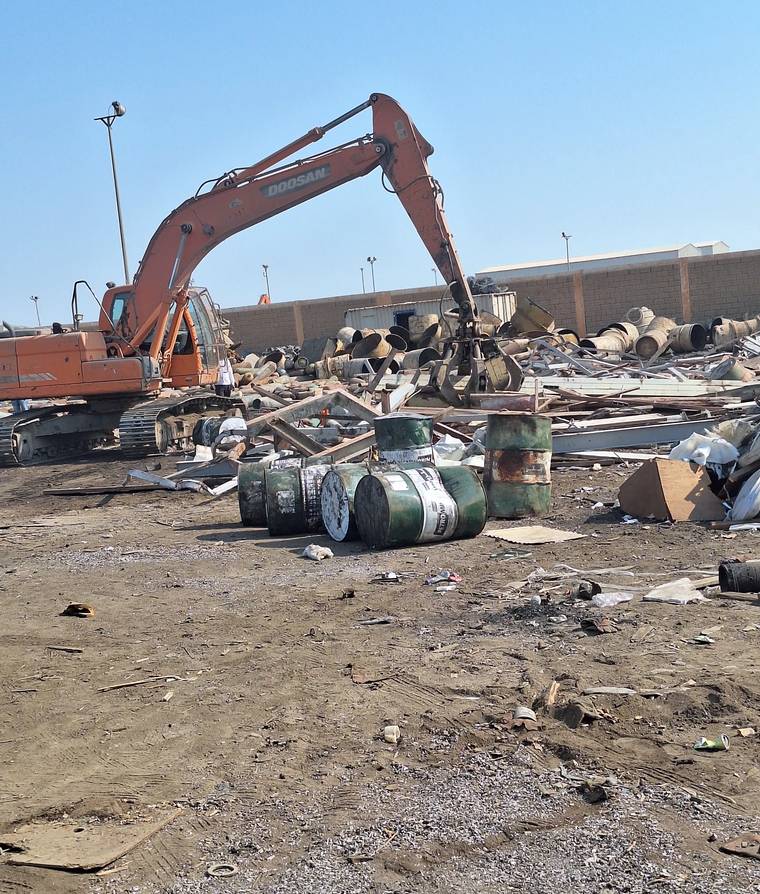 Our excavator working scrap metal at the Dammam yard